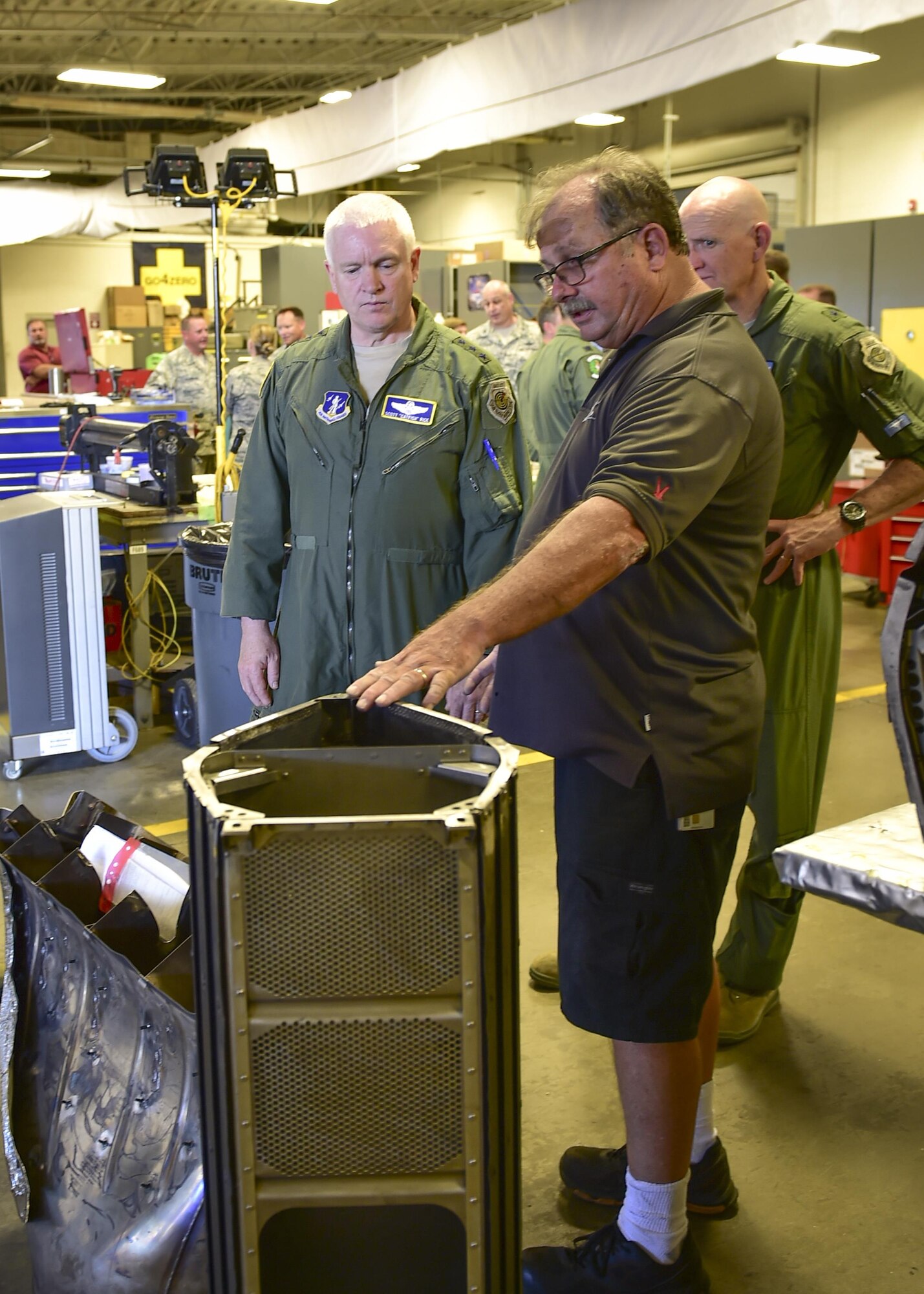 Brian Sawyer, an on-site quick response team technician with the Air Force Special Operations Command, briefs Lt. Gen. L. Scott Rice, director of the Air National Guard, on CV-22 Osprey Maintenance at Hurlburt Field, Fla., July 7, 2016. Rice is responsible for formulating, developing and coordinating policies, plans and programs affecting more than 105,500 ANG members and civilians in more than 90 wings. (U.S. Air Force photo by Senior Airman Jeff Parkinson)