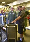 Brian Sawyer, an on-site quick response team technician with the Air Force Special Operations Command, briefs Lt. Gen. L. Scott Rice, director of the Air National Guard, on CV-22 Osprey Maintenance at Hurlburt Field, Fla., July 7, 2016. Rice is responsible for formulating, developing and coordinating policies, plans and programs affecting more than 105,500 ANG members and civilians in more than 90 wings. (U.S. Air Force photo by Senior Airman Jeff Parkinson)