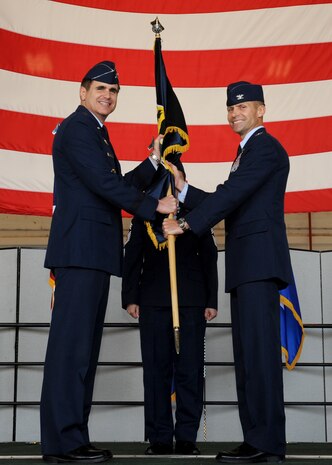 Col. Larry Broadwell (right) takes command of the 9th Reconnaissance Wing during a change of command ceremony at Beale Air Force Base, California July 8, 2016. Bradford will be responsible for more than 7,000 Airmen and civilians as well as the Air Force's entire high-altitude reconnaissance fleet of RQ-4 Global Hawk and U-2 Dragon lady aircraft. (U.S. Air Force photo by Staff Sgt. Robert M. Trujillo)