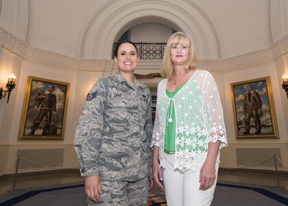 Staff Sgt. Elizabeth Diaz, 502nd Logistics Readiness Squadron NCO in charge of packing and crating, and Tracey Powell, 502nd Security Forces Logistics Support Group deputy director of the commander’s action and Taj facility manager, meet in the Clark Rotunda of the Taj May 18, 2016. Powell succeeded Diaz as the facility manager and now handles day-to-day operations of the building. 