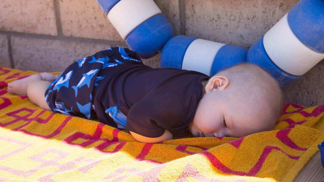 Brayden Dacier, 5 months, enjoys a restful nap after a rigorous day at the Marine Corps Community Services All American BBQ held at the Oasis Swimming Pool and Water Park aboard Marine Corps Logistics Base Barstow, July 4. Brayden attended the event with his mother, Andrea and his father, Cpl. Brandon Dacier, the base's training noncommissioned officer. 