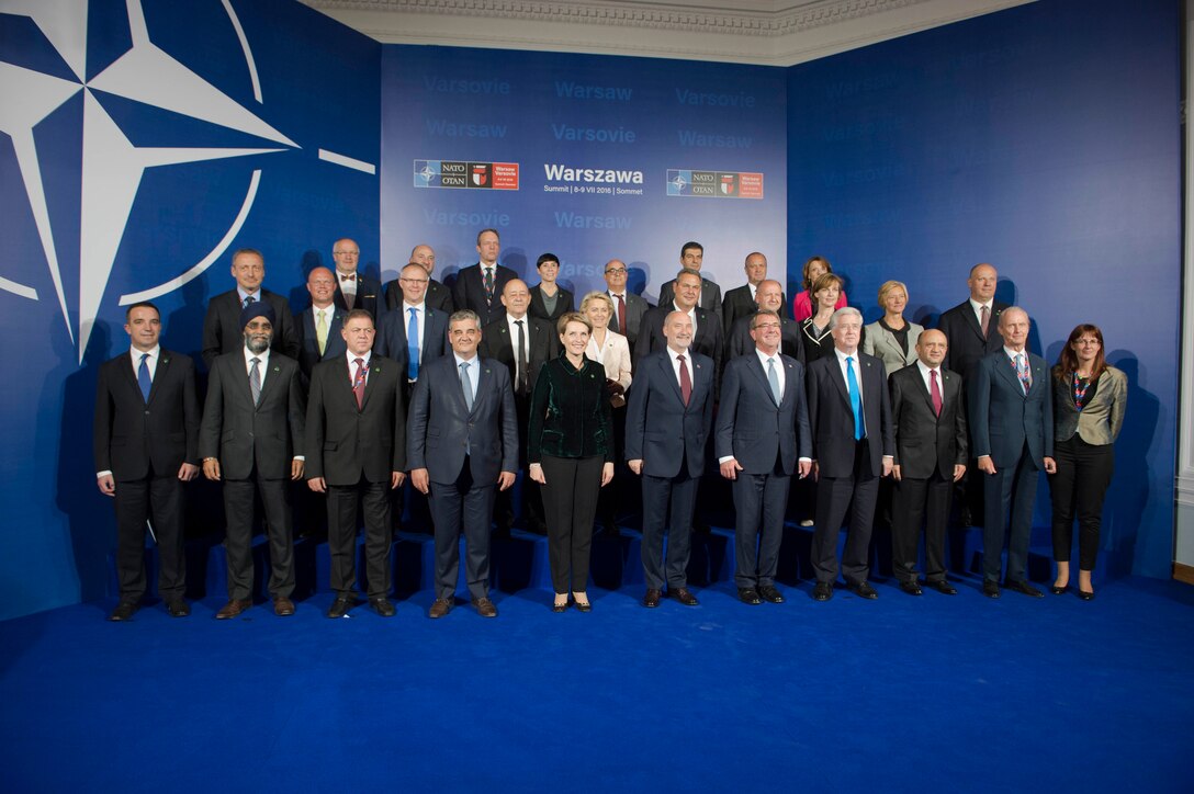 Defense Secretary Ash Carter, fifth from right, poses for a photo with a group of NATO defense ministers at the NATO Summit in Warsaw, Poland, July 8, 2016. DoD photo by Navy Petty Officer 1st Class Tim D. Godbee