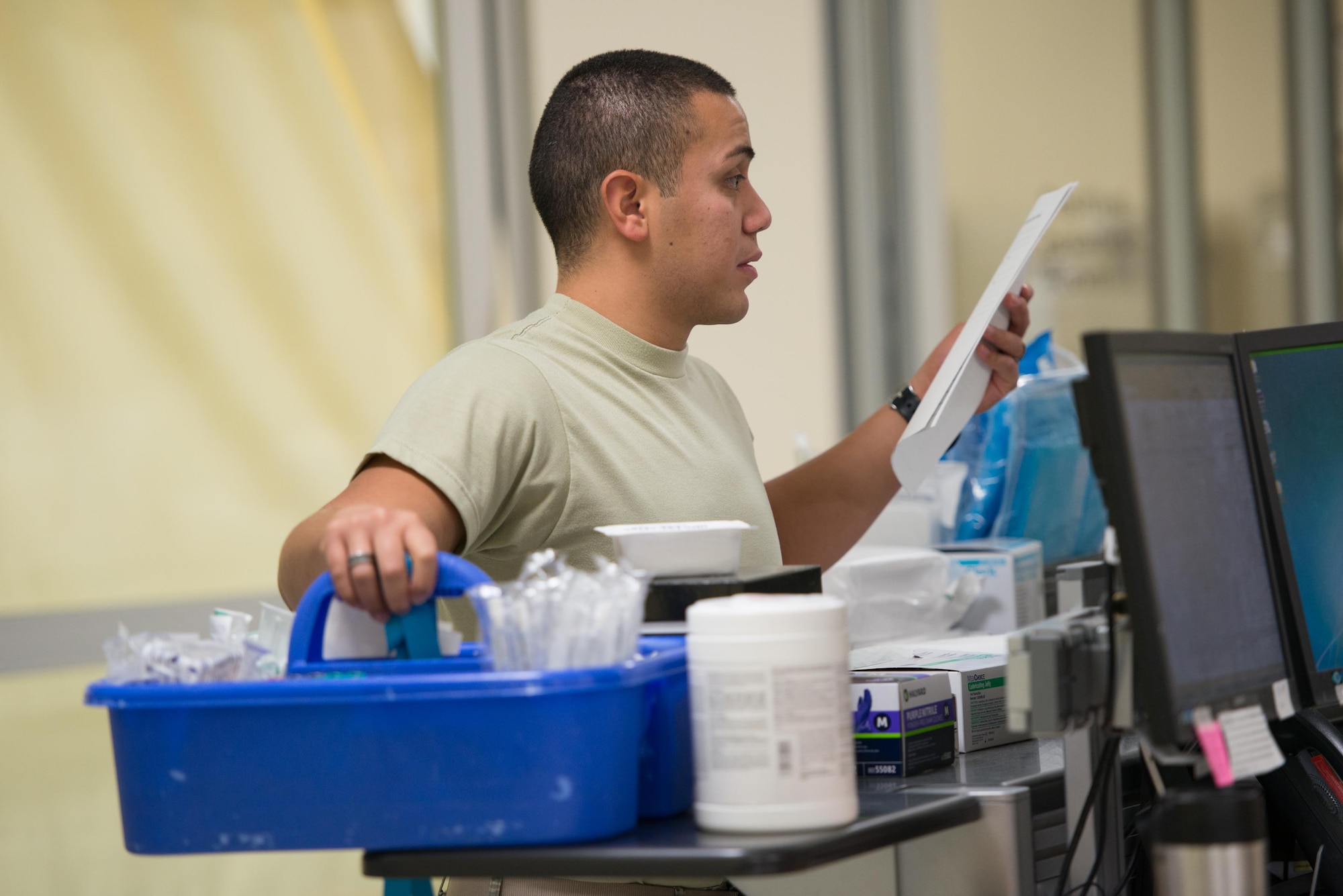Airman 1st Class Daniel Anchondo, 81st Medical Operations Squadron lab technician, prepares to draw bloodwork from a patient in the emergency services department at the Keesler Medical Center July 1, 2016, on Keesler Air Force Base, Miss. Keesler’s emergency room, which is open 24/7, sees around 2,000 patients monthly and is one of several clinics in the medical center. (U.S. Air Force photo by Marie Floyd/Released)