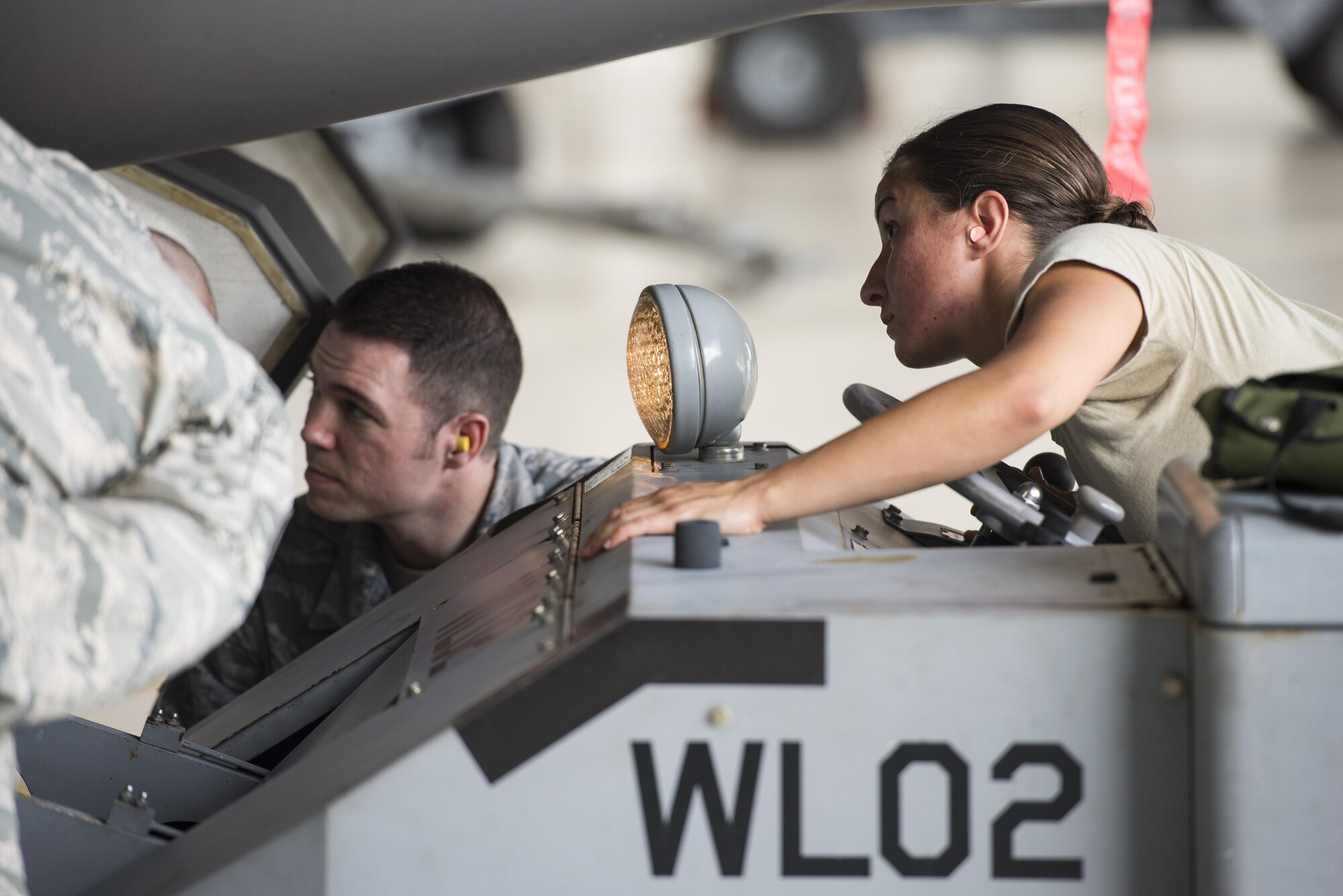 Senior Airman Danielle Gschwendner, 33rd Aircraft Maintenance Squadron load crew member, drives a jammer during a weapons load crew competition July 8, 2016, at Eglin Air Force Base, Fla. The load crew competition showcased the efficiency of load crew teams to safely and properly arm an F-35 within time constraints. (U.S. Air Force photo by Senior Airman Stormy Archer/Released)
