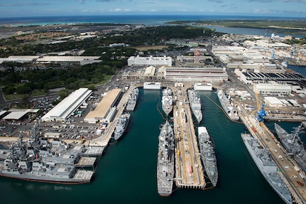An aerial view of ships moored at Joint Base Pearl Harbor-Hickam for Rim of the Pacific 2016. Twenty-six nations, more than 40 ships and submarines, more than 200 aircraft, and 25,000 personnel are participating in RIMPAC from June 30 to Aug. 4, in and around the Hawaiian Islands and Southern California. The world's largest international maritime exercise, RIMPAC provides a unique training opportunity that helps participants foster and sustain the cooperative relationships that are critical to ensuring the safety of sea lanes and security on the world's oceans. RIMPAC 2016 is the 25th exercise in the series that began in 1971. 
