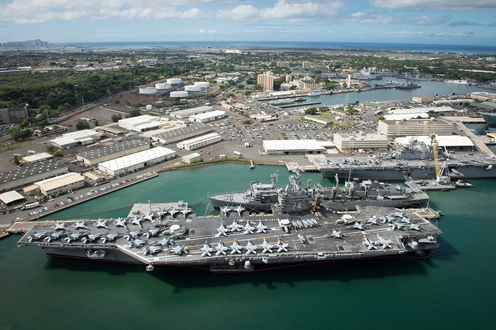 JOINT BASE PEARL HARBOR-HICKAM (July 6, 2016) An aerial view of ships moored at Joint Base Pearl Harbor-Hickam for Rim of the Pacific 2016. Twenty-six nations, more than 40 ships and submarines, more than 200 aircraft, and 25,000 personnel are participating in RIMPAC from June 30 to Aug. 4, in and around the Hawaiian Islands and Southern California. The world's largest international maritime exercise, RIMPAC provides a unique training opportunity that helps participants foster and sustain the cooperative relationships that are critical to ensuring the safety of sea lanes and security on the world's oceans. RIMPAC 2016 is the 25th exercise in the series that began in 1971.