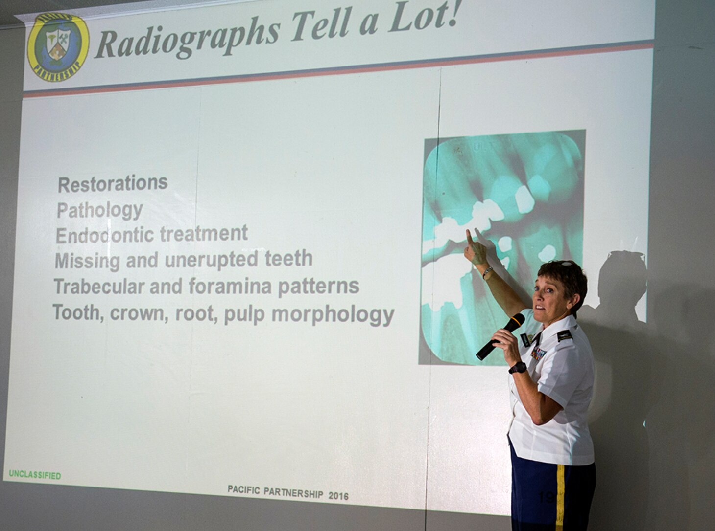 160630-N-BB534-836 LEGAZPI CITY, Philippines -- Army Col. Lisa Franklin, gives a presentation during the Joint Disaster Management Symposium at Bicol Regional Training and Teaching Hospital. The symposium gave Pacific Partnership 2016 personnel, members of the Armed Forces of the Philippines, and local medical personnel the chance to have an open dialogue about disaster management relief, in a medical context. Pacific Partnership is visiting the Philippines for the seventh time since its first mission in 2006. Partner nations are working side-by-side with local military and non-government organizations to conduct cooperative health engagements, community relation events and subject matter expert exchanges to better prepare for a natural disaster or crisis. 