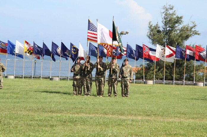 The 1st Battalion, 1st Special Forces Group assembled beneath the Okinawan sun on Border Landing Zone at Torii Station June 29 for a Change of Command Ceremony that bookmarked the latest chapter in the storied lineage of the unit.  