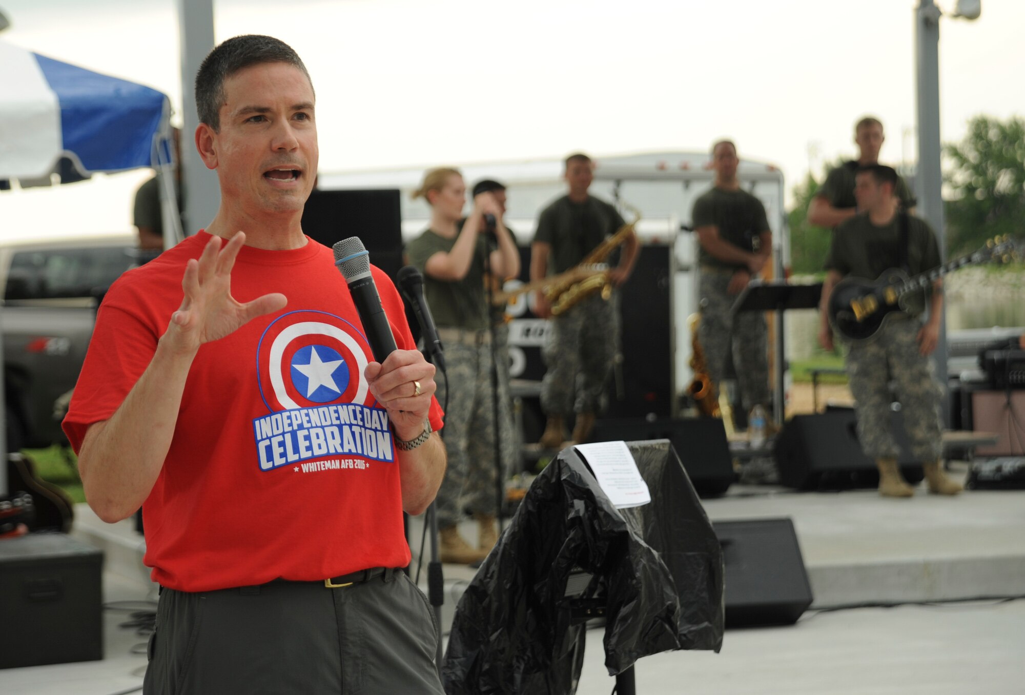 U.S. Air Force Brig. Gen. Paul W. Tibbets IV, the 509th Bomb Wing commander, gives opening remarks during the Independence Day Celebration at Whiteman Air Force Base, Mo., June 30, 2016. A performance by the Missouri National Guard’s 135th Army Band followed the opening remarks. (U.S. Air Force photo by Senior Airman Danielle Quilla)