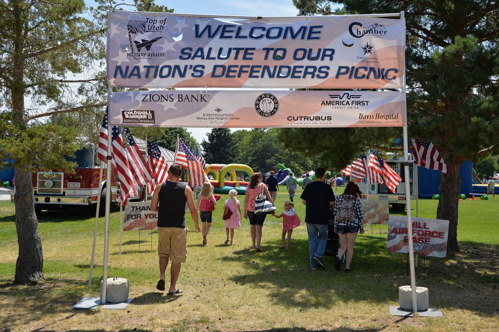 Military members and their families attend the Salute to Our Nation's Defenders Picnic July 8 at Centennial Park, Hill Air Force Base, Utah. The Top of Utah Military Affairs Committee invited all active duty, Guard and Reserve military and family members to join them for their annual Salute Picnic. TOUMAC is a joint committee between the Davis Chamber of Commerce and the Ogden/Weber Chamber of Commerce. They sponsor other events for Hill's military and civilian employees, including military appreciation nights at the Ogden Raptors baseball games and at Weber State University football games (U.S. Air Force photo by R. Nial Bradshaw)