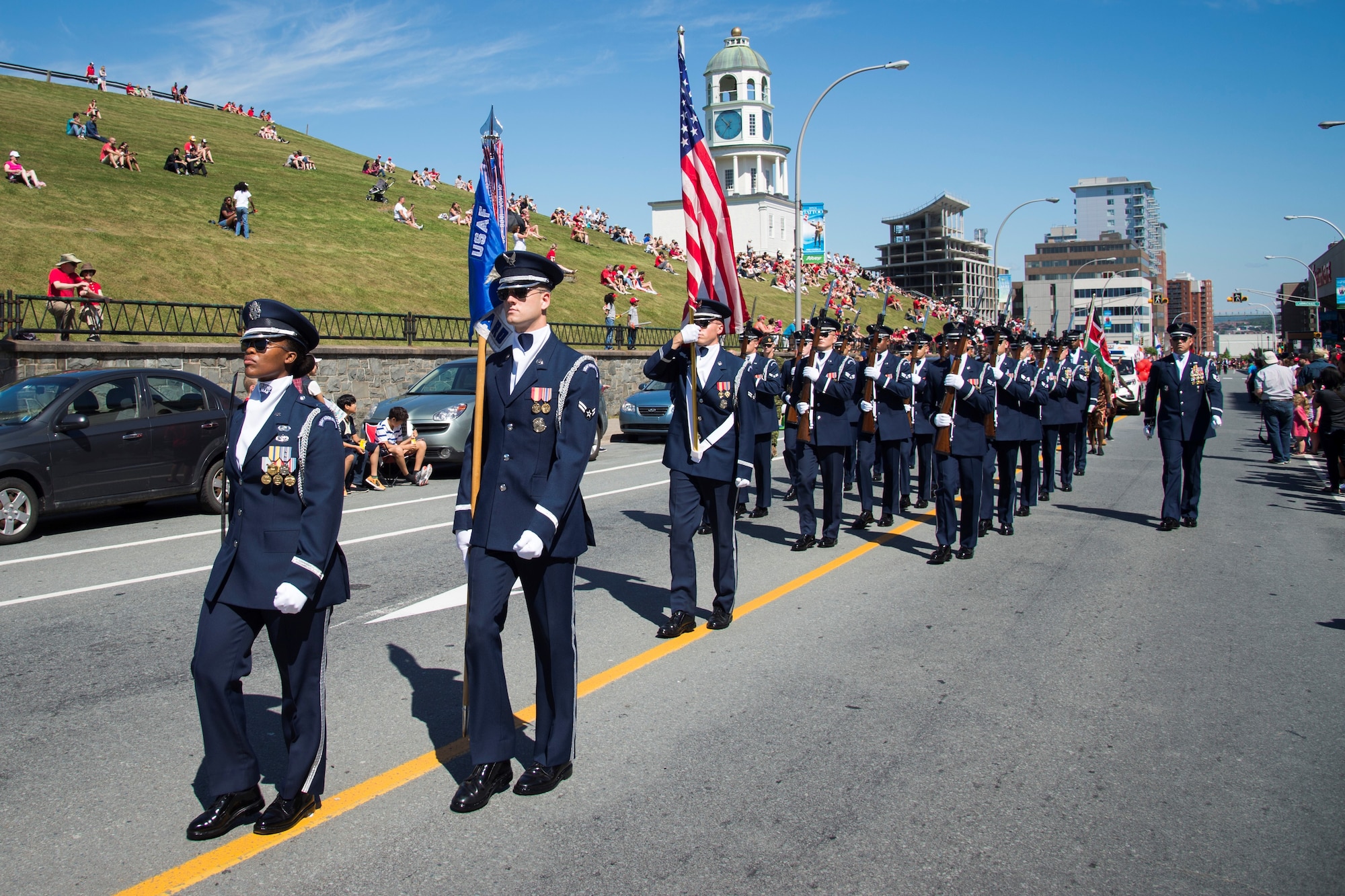Members of the U.S. Air Force Honor Guard Drill Team march during a Canada Day parade as part of the 2016 Royal Nova Scotia International Tattoo in Halifax, Nova Scotia. Canada Day celebrates the actions on July 1, 1867, when Canada became a new federation with its own constitution. (U.S. Air Force photo by Senior Airman Ryan J. Sonnier)