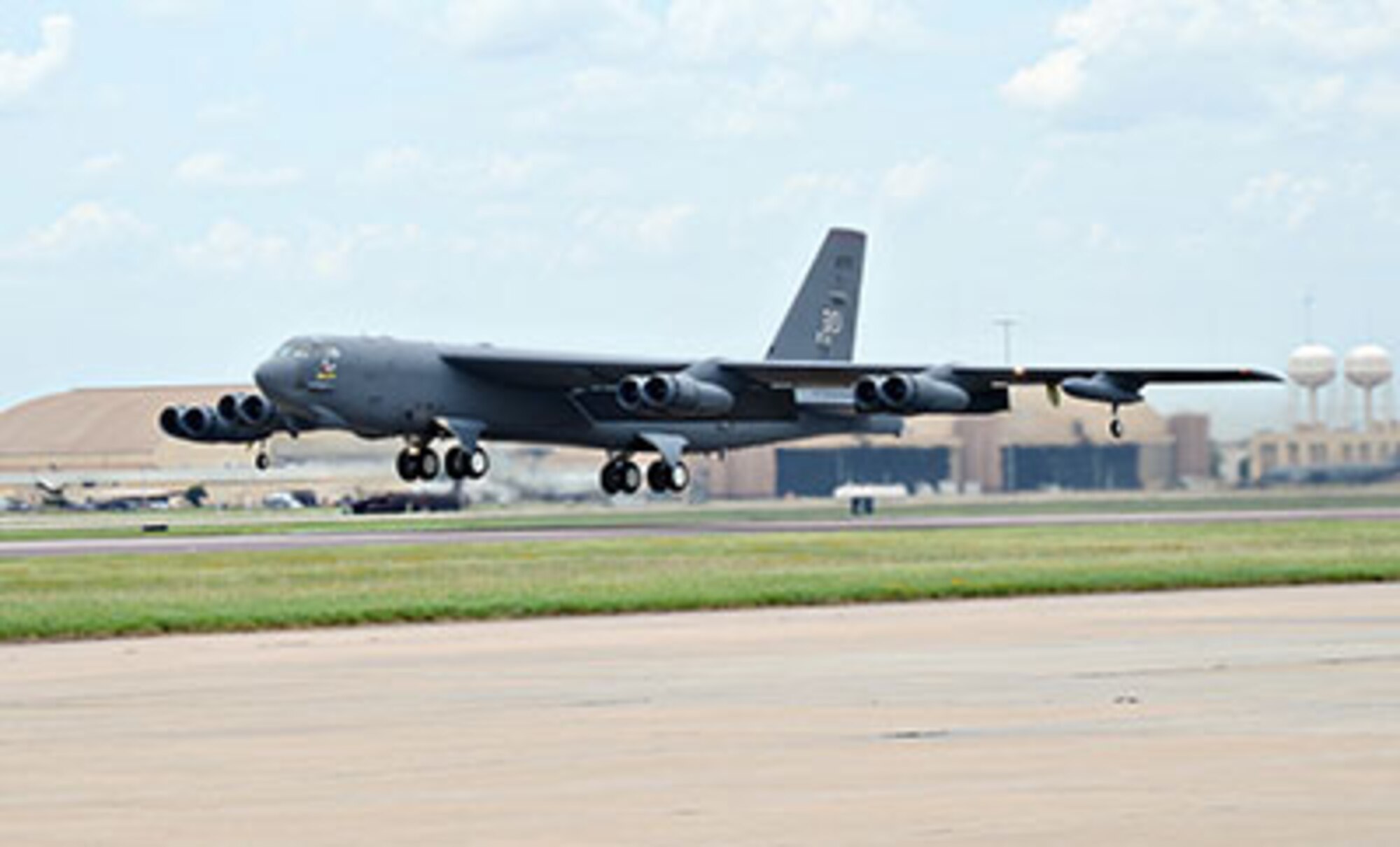 A B-52 Stratofortress takes off from the Tinker airfield on June 24. The 565th Aircraft Maintenance Squadron is installing the Combat Network Communications Technology (CONECT) upgrade to the aircraft to allow the flightcrew to send and receive almost instant data vital to their missions. (Air Force photo by Kelly White/Released)