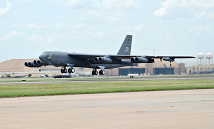 A B-52 Stratofortress takes off from the Tinker airfield on June 24. The 565th Aircraft Maintenance Squadron is installing the Combat Network Communications Technology (CONECT) upgrade to the aircraft to allow the flightcrew to send and receive almost instant data vital to their missions. (Air Force photo by Kelly White/Released)