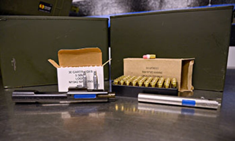 Simunitions, non-lethal simulated ammunition, are used for more realistic training, such as for shooting fundamentals, force on force and battle drills. The 72nd Security Forces Squadron will use the 5.56mm cartridges, left, for their M4 rifles and the 9mm cartridges for their M9 Berettas, as well as conversion barrels for both. (Air Force photo by Kelly White/Released)

