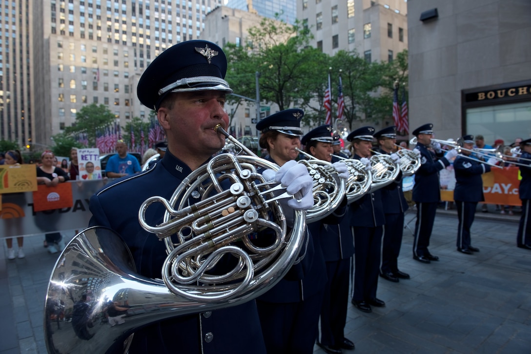 The Ceremonial Brass performed live on Rockefeller Plaza for NBC's The TODAY Show in New York City.  The July 4th performance featured Master Sergeant Tara Islas' arrangement of Strike Up The Band. (USAF Photo by Chief Master Sgt Bob Kamholz/released)