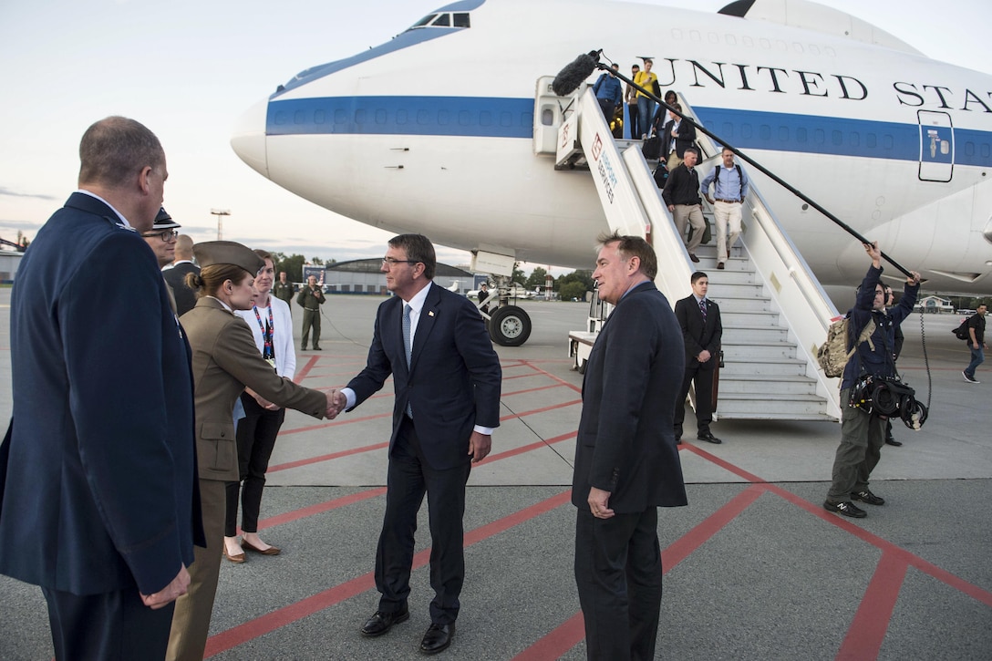 Defense Secretary Ash Carter greets Polish troops upon arriving in Warsaw, Poland, July 7, 2016. for the NATO Summit. DoD photo by Navy Petty Officer 1st Class Tim D. Godbee