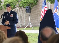 Col. James Phillips, the 919th Special Operations Wing commander, speaks to the crowd at the wing headquarters building dedication ceremony at Duke Field, Fla., July 8.  The building was dedicated to the 919th’s founding member, retired Brig. Gen. Donald Haugen, who created the 919th Tactical Airlift Group in 1971.  (U.S. Air Force photo/Tech. Sgt. Sam King)