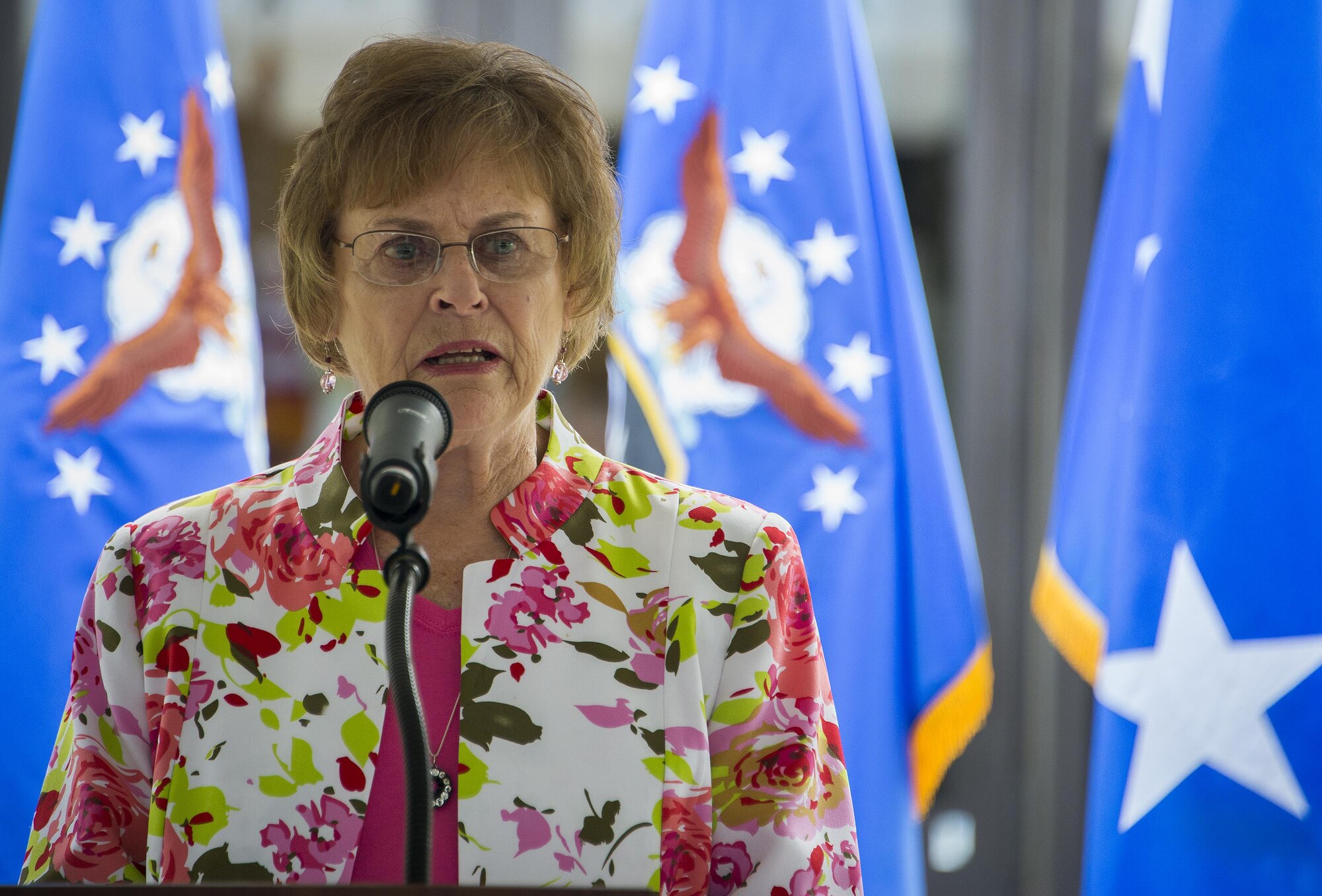 Judy Haugen, widow of retired Brig. Gen. Donald Haugen, speaks to the crowd at the 919th Special Operations Wing headquarters building dedication ceremony at Duke Field, Fla., July 8.  The building was dedicated to the 919th’s founding member, Haugen, who created the 919th Tactical Airlift Group in 1971.  (U.S. Air Force photo/Tech. Sgt. Sam King)