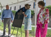 The family of retired Brig. Gen. Donald Haugen, unveil a bronze plaque at the 919th Special Operations Wing headquarters building dedication ceremony at Duke Field, Fla., July 8.  The building was dedicated to the 919th’s founding member, Haugen, who created the 919th Tactical Airlift Group in 1971.  The plaque will be placed on the outside of the newly-named Haugen Headquarters.  (U.S. Air Force photo/Tech. Sgt. Sam King)