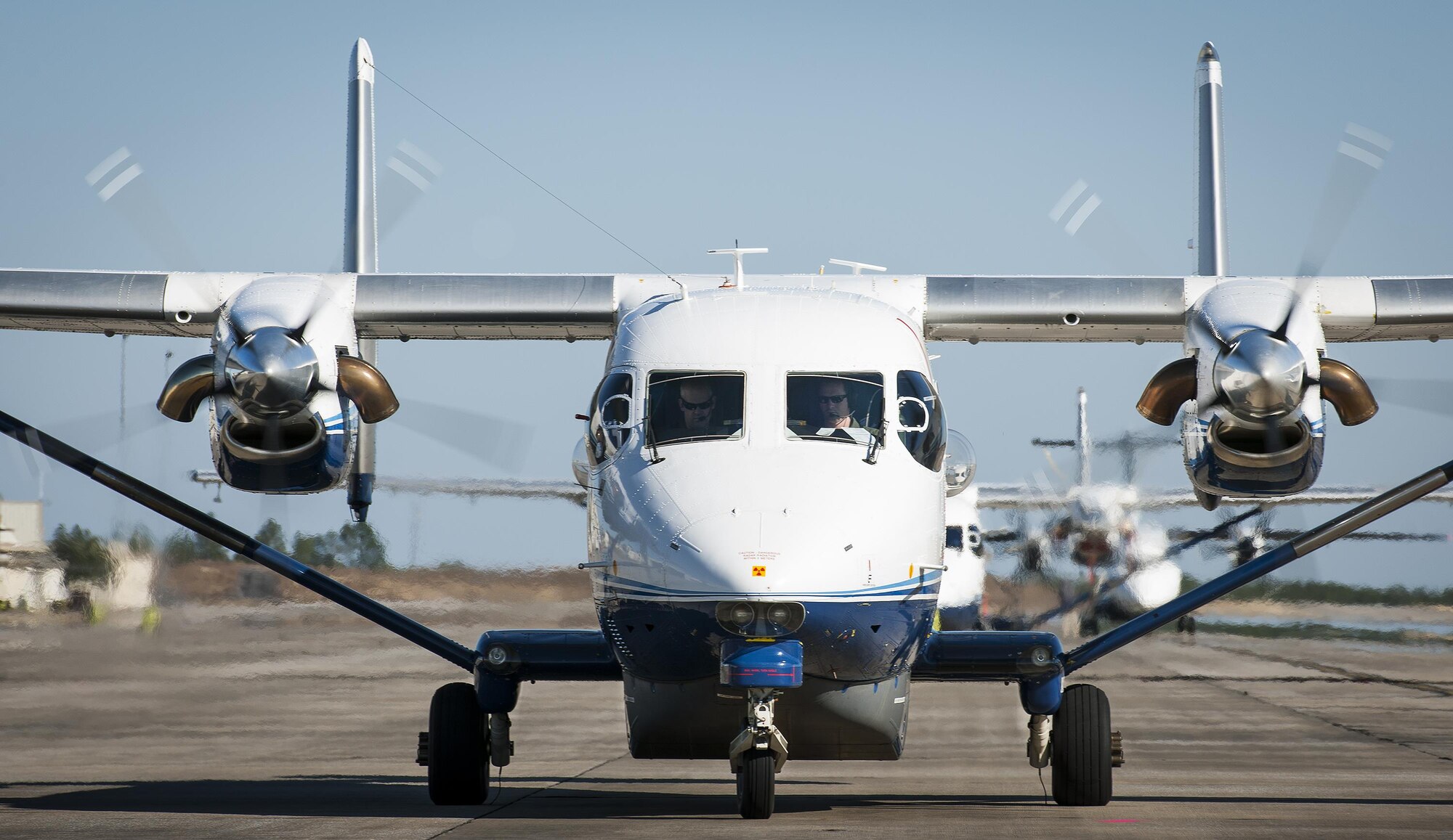 An aircrew prepares for a mission in a C-145A Skytruck at Duke Field, Fla.  The 919th Special Operations Wing is the only wing in the Air Force that flies and maintains the Skytruck.  They are primarily used for new aircrew qualifications and flight proficiency missions.  (U.S. Air Force photo/Tech. Sgt. Sam King)  