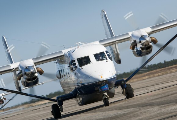 An aircrew prepares for a mission in a C-145A Skytruck at Duke Field, Fla.  The 919th Special Operations Wing is the only wing in the Air Force that flies and maintains the Skytruck.  They are primarily used for new aircrew qualifications and flight proficiency missions.  (U.S. Air Force photo/Tech. Sgt. Sam King)  