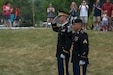 Cpt. Zachary Galaboff, left, and Sgt. Peter Garcia, both assigned to the 416th Theater Engineer Command, render the hand salute as the national anthem is sung at the beginning of the Independence Day Celebrations in Brookfield, Illinois, Jul.4, 2016. (U.S. Army photo by Staff Sgt. Jason Proseus/Released)