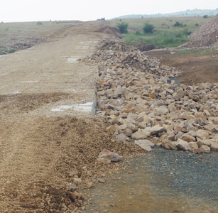 841st Engineer Battalion, U.S. Army reserve, Operation Resolute Castle, 2nd July 2016 conducts roadway work using articulated concrete block (ACB) matte which are concrete blocks connected by rope-like cables which allows each individual block to be flexible to conform to the terrain. (U.S. Army photo by Spc. Luis Ballester, 841st Engineer Battalion, United States Army Reserve)