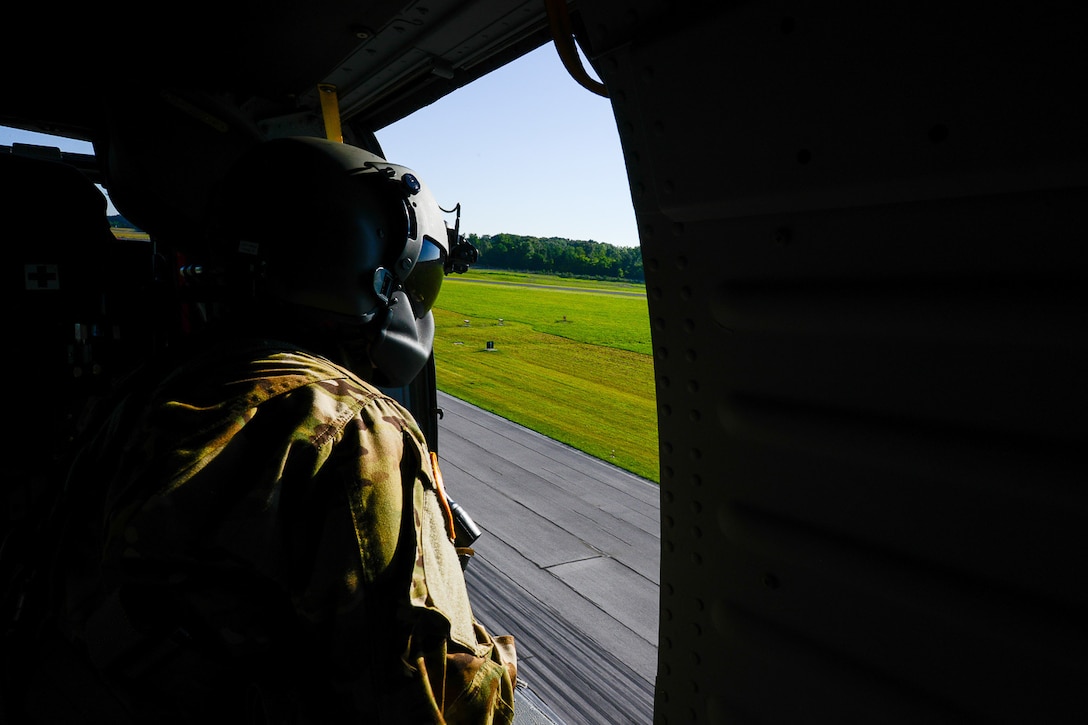 Sgt. Brandon Vititoe, a crew chief from the 11th Theater Aviation Command, conducts pre-flight checks during a joint training exercise with the 19th Engineer Battalion. The training took place on Fort Knox, Ky., from Jun 27-29. (Photos by Kevin Coates / Fort Knox Visual Information)