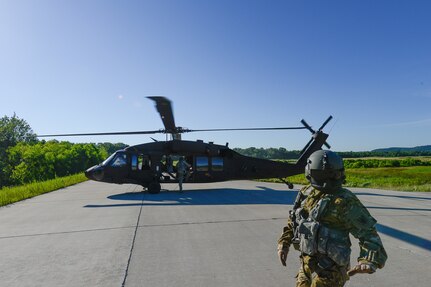 Sgt. Brandon Vititoe, a crew chief from the 11th Theater Aviation Command, conducts pre-flight checks during a joint training exercise with the 19th Engineer Battalion. The training took place on Fort Knox, Ky., from Jun 27-29. (Photos by Kevin Coates / Fort Knox Visual Information)