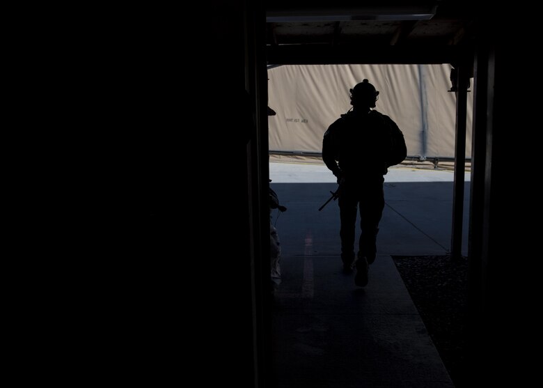 Staff Sgt. Roderick Campbell, 83rd Expeditionary Rescue Squadron pararescueman, makes his way to a HH-60G Pave Hawk, June 09, 2016, Bagram Airfield, Afghanistan. Members of the 83rd ERQS practice personnel recovery and work with other air assets to eliminate threats in the area and safely recover isolated personnel. (U.S. Air Force photo by Senior Airman Justyn M. Freeman)