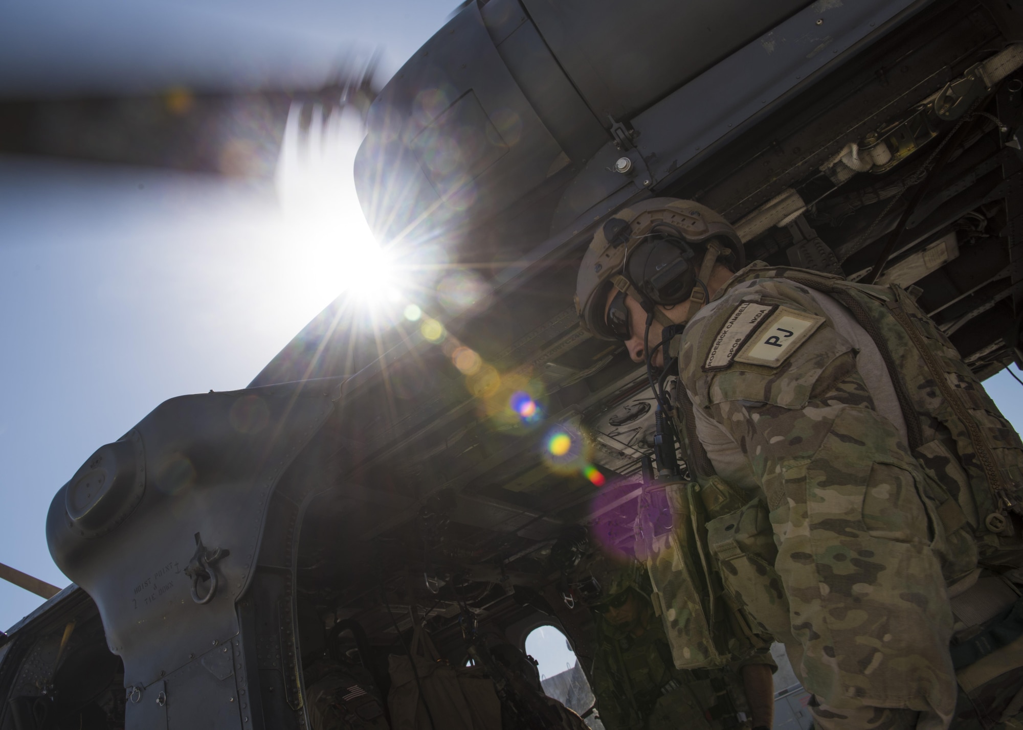 Staff Sgt. Roderick Campbell, 83rd Expeditionary Rescue Squadron pararescueman, boards an HH-60G Pave Hawk participating in a personnel recovery exercise, June 09, 2016, Bagram Airfield, Afghanistan. The 83rd ERQS provides the only isolated personnel recovery capability to U.S. forces in Afghanistan. (U.S. Air Force photo by Senior Airman Justyn M. Freeman)