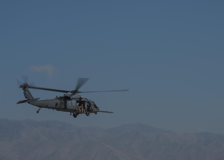 Airmen from the 83rd Expeditionary Rescue Squadron take off on HH-60G Pave Hawks, June 09, 2016, Bagram Airfield, Afghanistan. The 83rd ERQS provides the only isolated personnel recovery capability to U.S. forces in Afghanistan. (U.S. Air Force photo by Senior Airman Justyn M. Freeman)