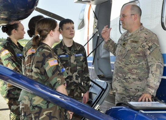 Lt. Col. Stephen Carr, 5th Special Operations Squadron, talks to the local Civil Air Patrol squadron about the 919th Special Operations Wing’s mission and its aircraft, the C-145 Skytruck, at Duke Field, June 17.  (U.S. Air Force photo/Dan Neely)