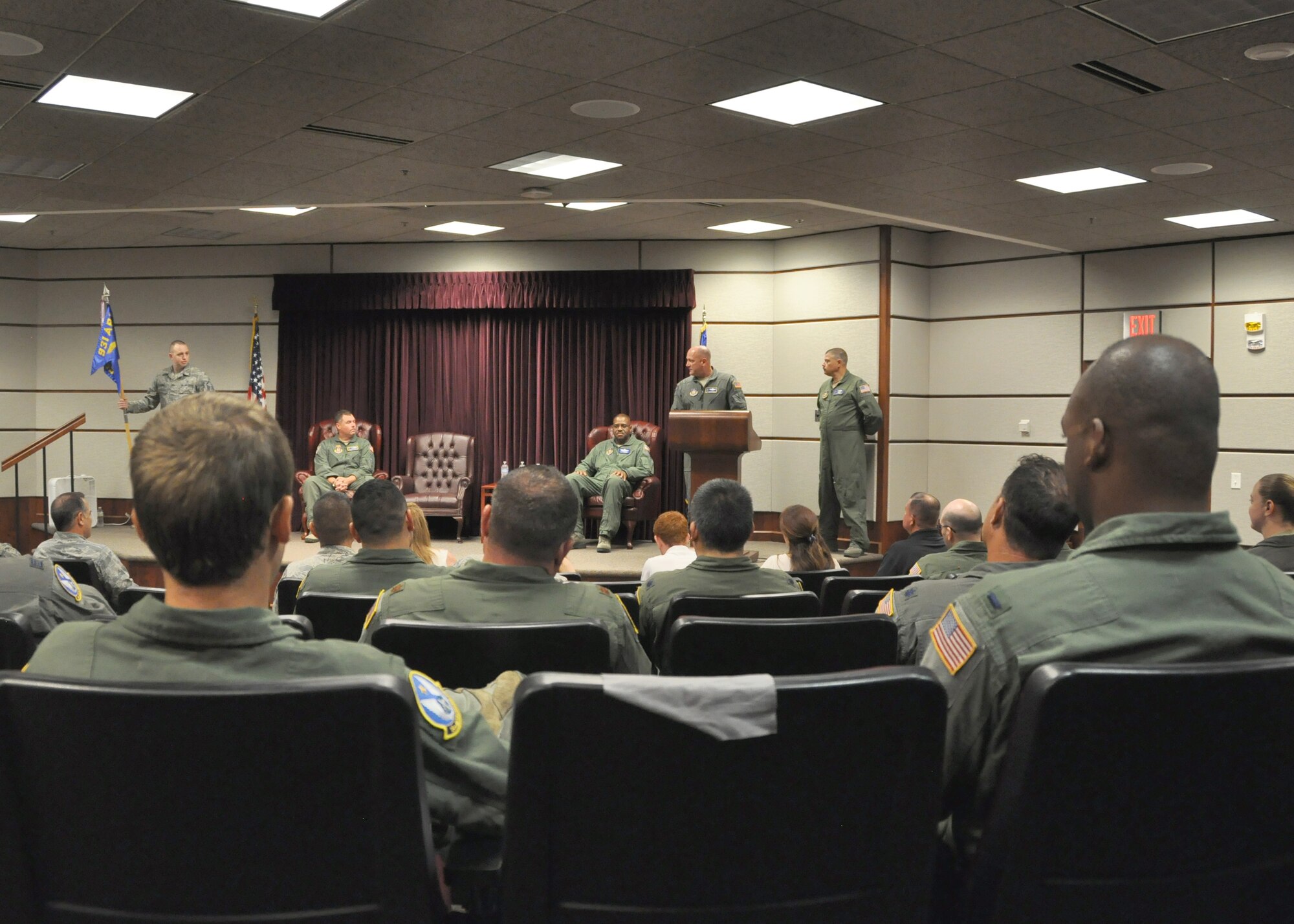 Citizen Airmen with the 931st Air Refueling Wing watch the 931 OSS change of command ceremony July 10, 2016, McConnell Air Force Base, Kan. While primarily ceremonial, changes of command provide an official means to introduce Citizen Airmen to their new commander. (U.S. Air Force photo by Senior Airman Preston Webb)