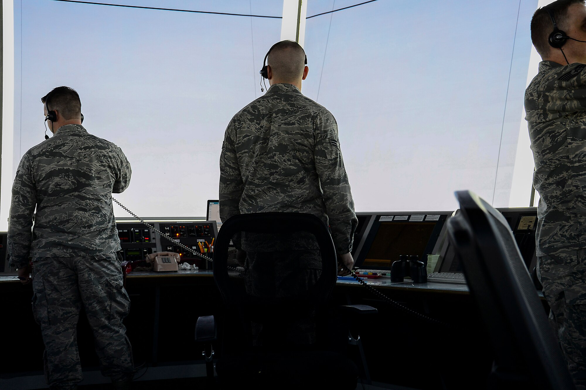 U.S. Air Force Airmen with the 379th Expeditionary Operations Support Squadron Air Traffic Control flight conduct day-to-day flight line operations at Al Udeid Air Base, Qatar, June 13, 2016. ATC members are tasked with the mission of the safe and orderly handling of aircraft and working with other agencies to ensure aircraft take-off in a timely manner to support operations throughout the region. (U.S. Air Force photo by Senior Airman Kimberly Nagle)  