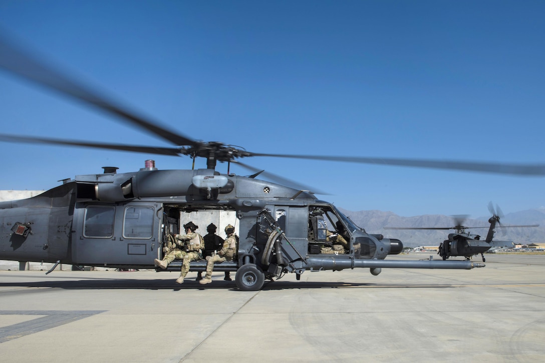 Airmen taxi out on HH-60G Pave Hawk helicopters before participating in a personnel recovery exercise at Bagram Airfield, Afghanistan, July 9, 2016. Air Force photo by Senior Airman Justyn M. Freeman