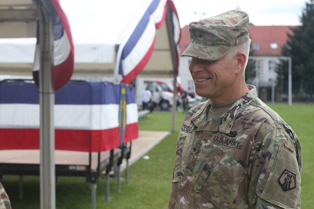 Brig. Gen. Arlan DeBlieck, the outgoing commander of the 7th Mission Support Command, smiles after the 7th MSC change of command ceremony Saturday, July 9, 2016 at Danner Kaserne in Kaiserslautern, Germany. (U.S. Army photo by Sgt. Daniel J. Friedberg, 7th Mission Support Command Public Affairs Office)