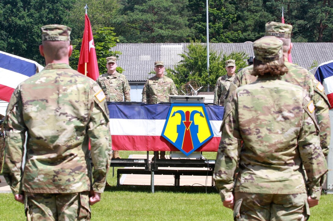 KAISERSLAUTERN, Germany- Maj. Gen. Duane A. Gamble (left), commander of the 21st Theater Support Command, joins the new commander of the 7th Mission Support Command, Brig. Gen. Steven W. Ainsworth (center) and the outgoing commander of the 7th MSC, Brig. Gen. Arlan M. DeBlieck (right) in relieving the unit at the conclusion of the change of command ceremony held at NCO Parade Field at Daenner Kaserne on July 9, 2016. (U.S. Army photo by Sgt. Daniel J. Friedberg, 7th Mission Support Command Public Affairs Office)