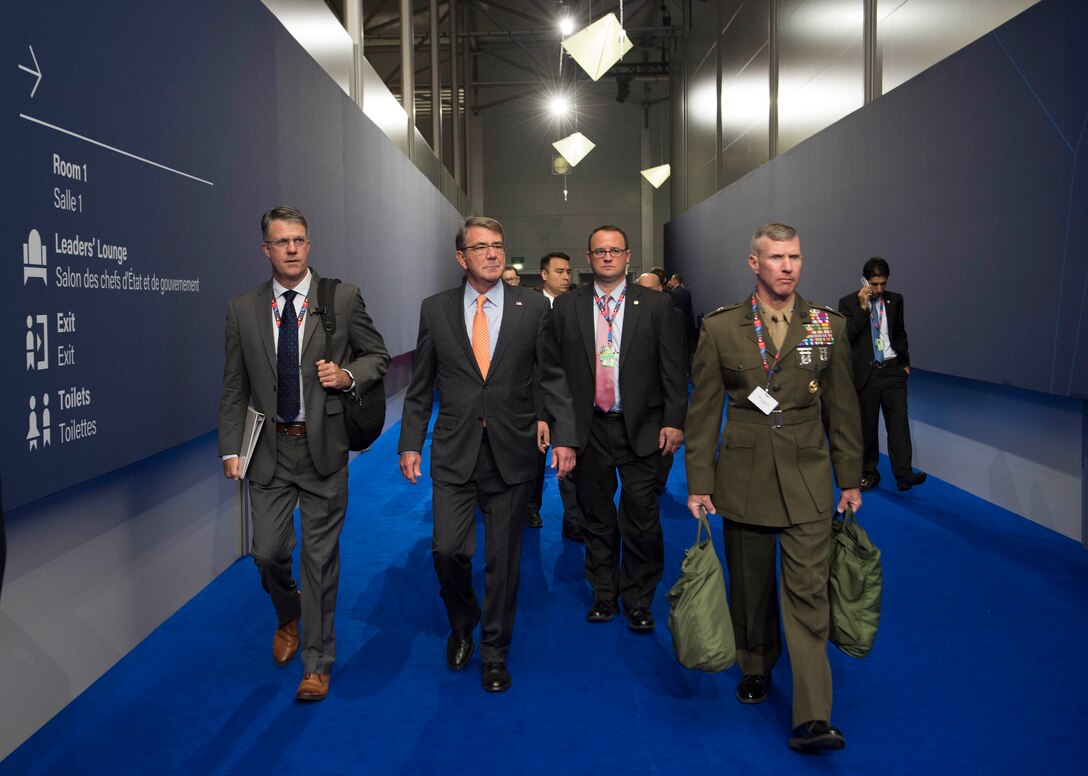Defense Secretary Ash Carter, second from left, and his staff arrive at the NATO Summit in Warsaw, Poland, July 9, 2016. Carter joined President Barack Obama at the summit to attend the North Atlantic Council meeting and discuss the Resolute Support mission in Afghanistan with alliance leaders and Carter's counterparts from partner nations. DoD photo by Navy Petty Officer 1st Class Tim D. Godbee