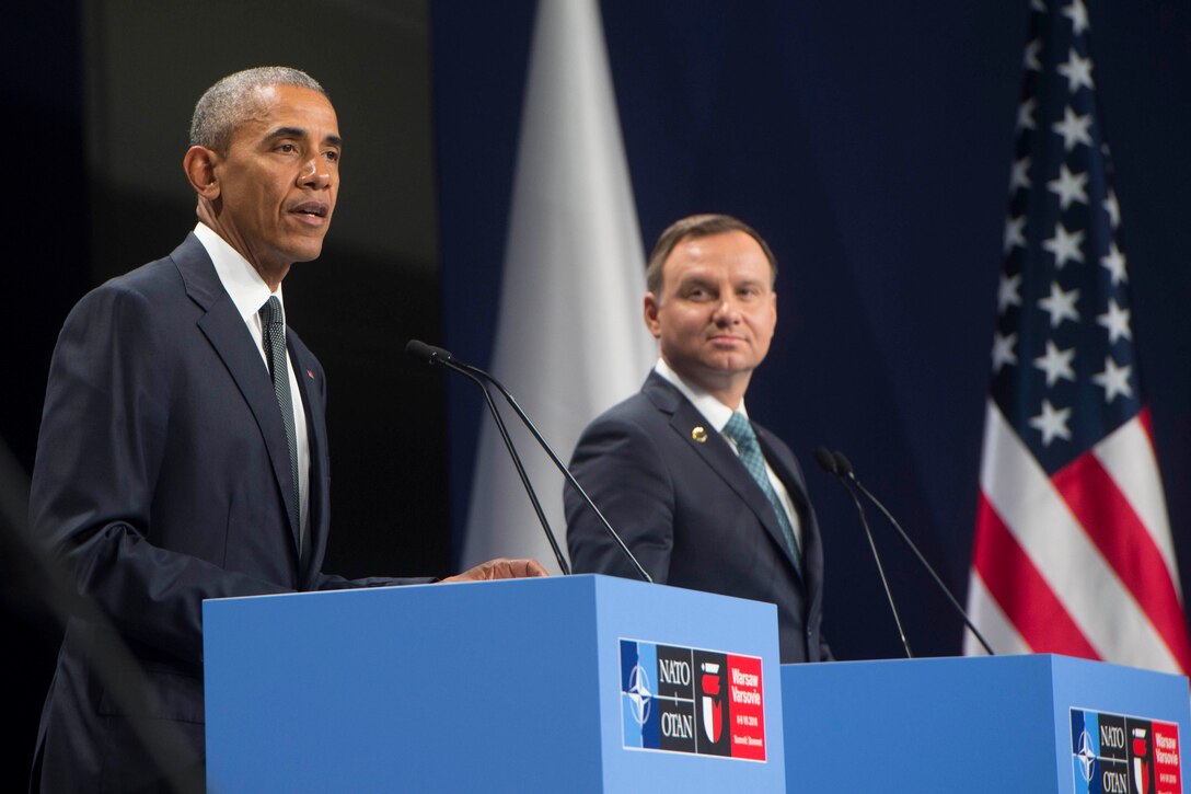 President Barack Obama, left, and Polish President Andrzej Duda address reporters at the NATO Summit in Warsaw, Poland, July 8, 2016. DoD photo by Navy Petty Officer 1st Class Tim D. Godbee