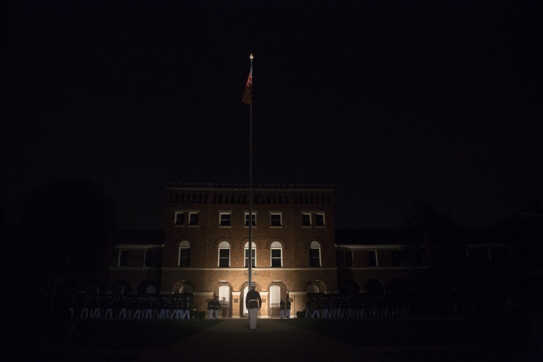 Marines of Marine Barracks Washington, D.C., perform during the Evening Parade, July 8, 2016. The guests of honor for the parade were Mr. Christian Brose, majority staff director, U.S. Senate Armed Services Committee, the Honorable Elizabeth L. King, minority staff director, U.S. Senate Armed Services Committee, Mr. Robert L. Simmons, majority staff director, U.S. House Armed Services Committee and Mr. Paul Arcangeli, minority staff director, U.S. House Armed Services Committee. The hosting official was Lt. Gen. Kenneth McKenzie Jr., director, J-5, Strategic Plans and Policy, Joint Staff. (Official Marine Corps photo by Cpl. Chi Nguyen/Released)