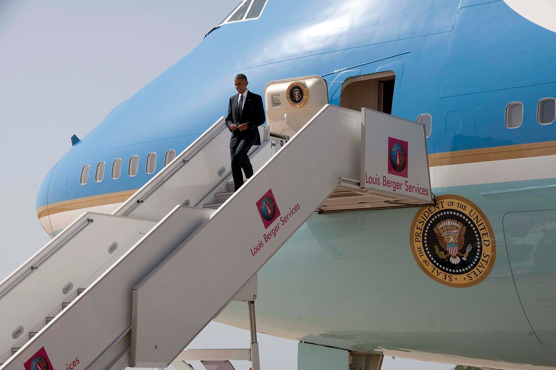 President Barack Obama departs Air Force One to begin his visit to Naval Station Rota, Spain, July 10, 2016. Navy photo by Petty Officer 1st Class Brian Dietrick