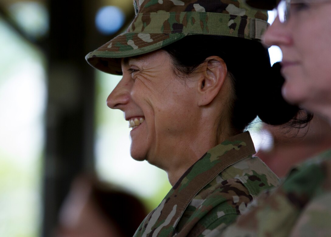 Brig. Gen. Marion Garcia, deputy commanding general for operations for the 200th Military Police Command, smiles during Maj. Gen. Phillip M. Churn’s relinquishment of command ceremony for the 200th Military Police Command at the McGlachlin Parade Field, on Fort Meade, Maryland., July 10, 2016.  Approximately 200 Soldiers from the command’s subordinate units attended the ceremony. (U.S. Army Photo by Sgt. Audrey Hayes)