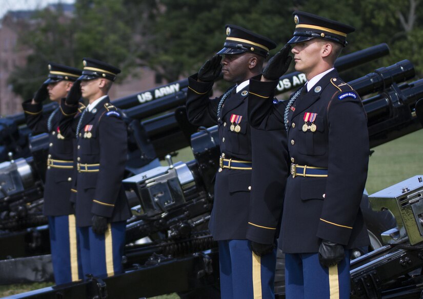 The 3rd U.S. Infantry Salute Guns Platoon renders a salute during the 200th Military Police Command’s relinquishment of command ceremony at the McGlachlin Parade Field, at Fort Meade, Md., July 10, 2016. Lieutenant General Charles D. Luckey, chief of the Army Reserve and commanding general of the United States Army Reserve Command, was the reviewing official for the ceremony, in which Maj. Gen. Phillip M. Churn relinquished command to Brig. Gen. Marion Garcia.  (U.S. Army photo by Spc. Stephanie Ramirez)
