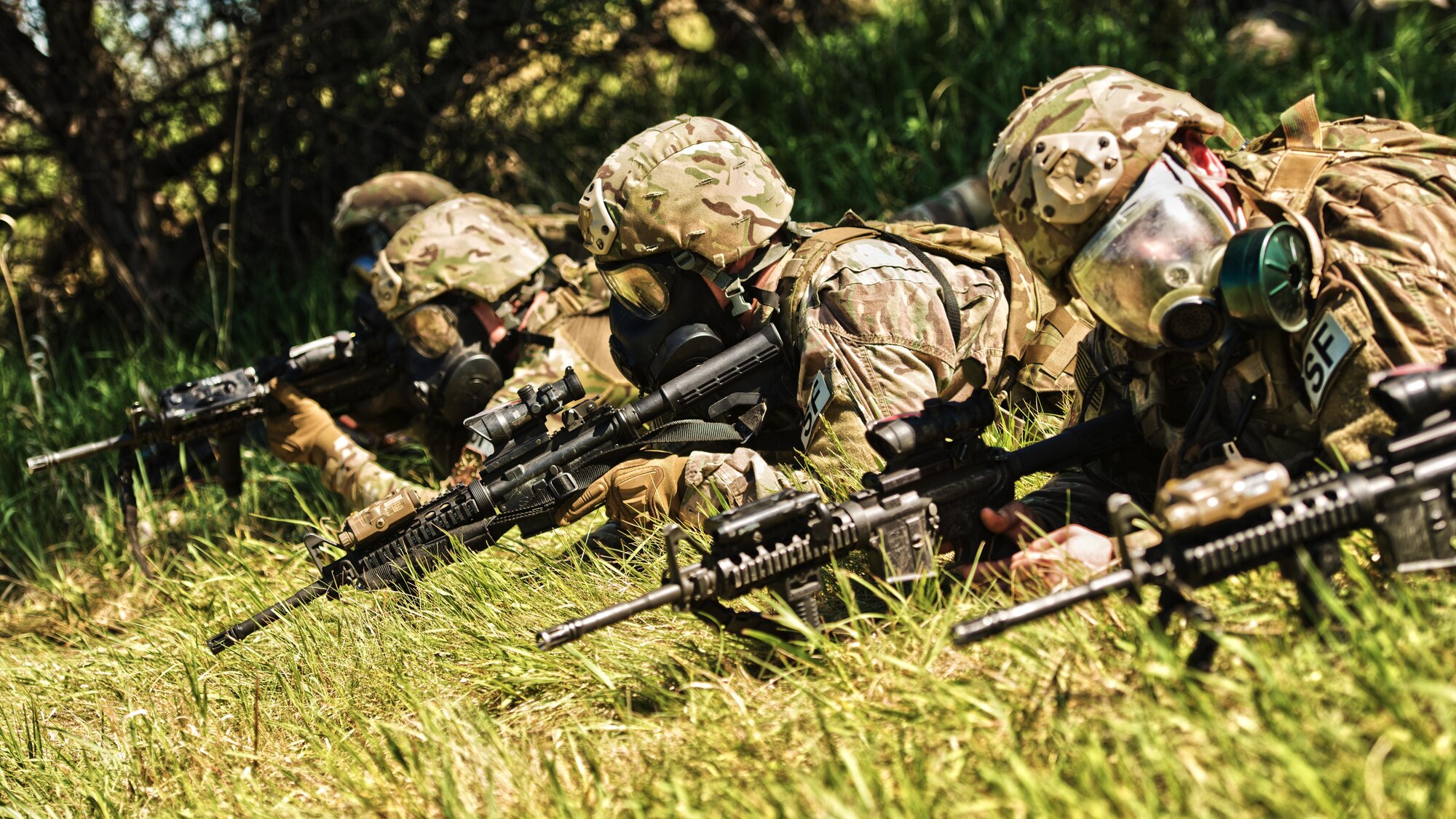 Defenders from the 791st Missile Security Forces Squadron participated in annual tactical training at Minot Air Force Base, N.D., May 23, 2016. Training stations allowed SF members to practice small unit combat tactics, employ inert smoke grenades and perform casualty care and evacuation. These exercises were just a small portion of the tactical maneuver training SF members receive annually. (U.S. Air Force photo/Airman 1st Class J.T. Armstrong)