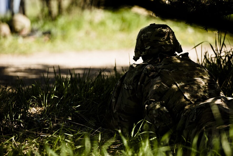 Defenders from the 791st Missile Security Forces Squadron participated in annual tactical training at Minot Air Force Base, N.D., May 23, 2016. Training stations allowed SF members to practice small unit combat tactics, employ inert smoke grenades and perform casualty care and evacuation. These exercises were just a small portion of the tactical maneuver training SF members receive annually. (U.S. Air Force photo/Airman 1st Class J.T. Armstrong)