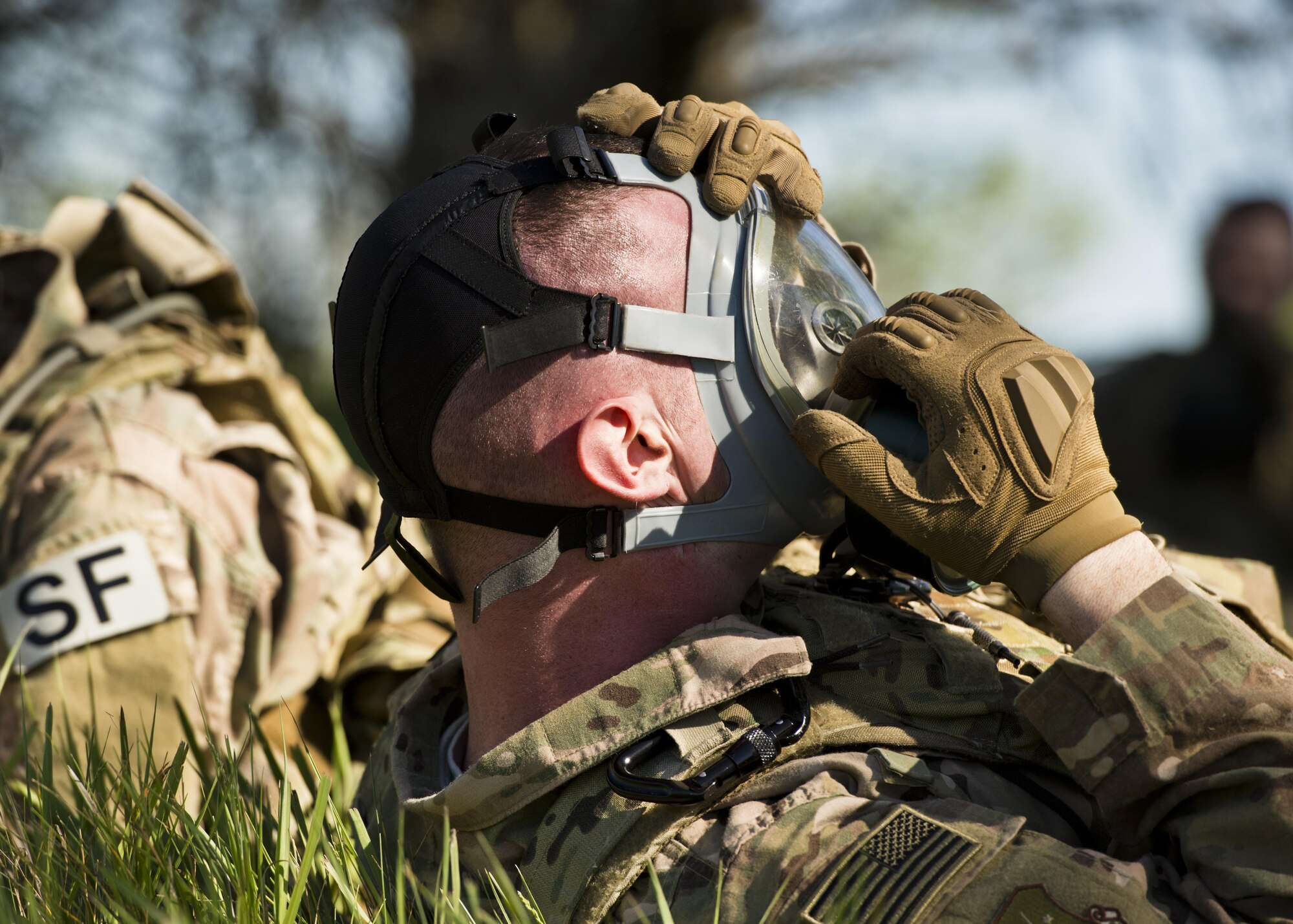 Defenders from the 791st Missile Security Forces Squadron participated in annual tactical training at Minot Air Force Base, N.D., May 23, 2016. Training stations allowed SF members to practice small unit combat tactics, employ inert smoke grenades and perform casualty care and evacuation. These exercises were just a small portion of the tactical maneuver training SF members receive annually. (U.S. Air Force photo/Airman 1st Class J.T. Armstrong)