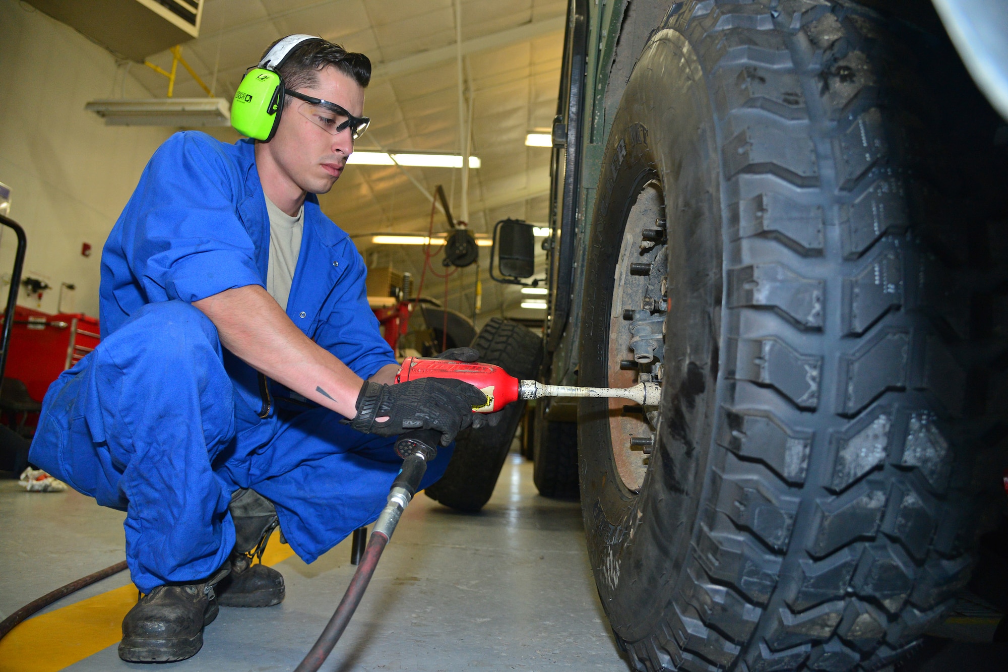 Senior Airmen Brennan Popp, 341st Logistics Readiness Squadron mission generating vehicular equipment maintenance technician, replaces the tire of a Humvee July 7, 2016, at Malmstrom Air Force Base, Mont. Humvee tires are usually driven between 15,000 and 20,000 miles before needing to be replaced. (U.S. Air Force photo/Airman 1st Class Daniel Brosam)