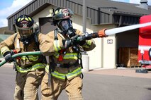 Airmen from the 341st Civil Engineer Squadron fire protection flight train April 13, 2016, at Malmstrom Air Force Base, Mont. Airmen train to be better prepared for the critical fire season during the Montana summer. (U.S. Air Force photo/Airman 1st Class Magen M. Reeves)