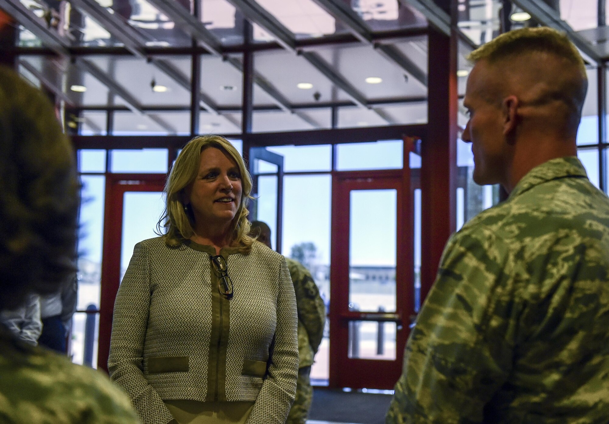 Air Force Secretary Deborah Lee James listens as Lt. Col. Keith Jansa, 8th Space Warning Squadron commander, speaks about the capabilities and missions performed by total force integrated partners July 7, 2016, at Buckley Air Force Base, Colo. During her time at the base, James viewed the 460th Space Wing’s Mission Control Station and spoke with space operators in their work centers and on the operations floor. (U.S. Air Force photo by Tech. Sgt. Nicholas Rau)